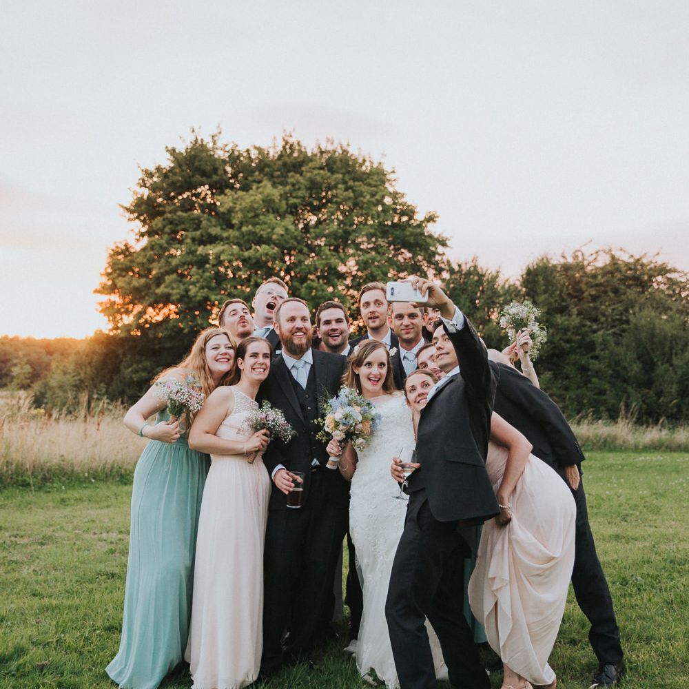A Cotswold rustic wedding with mismatched bridesmaid dresses