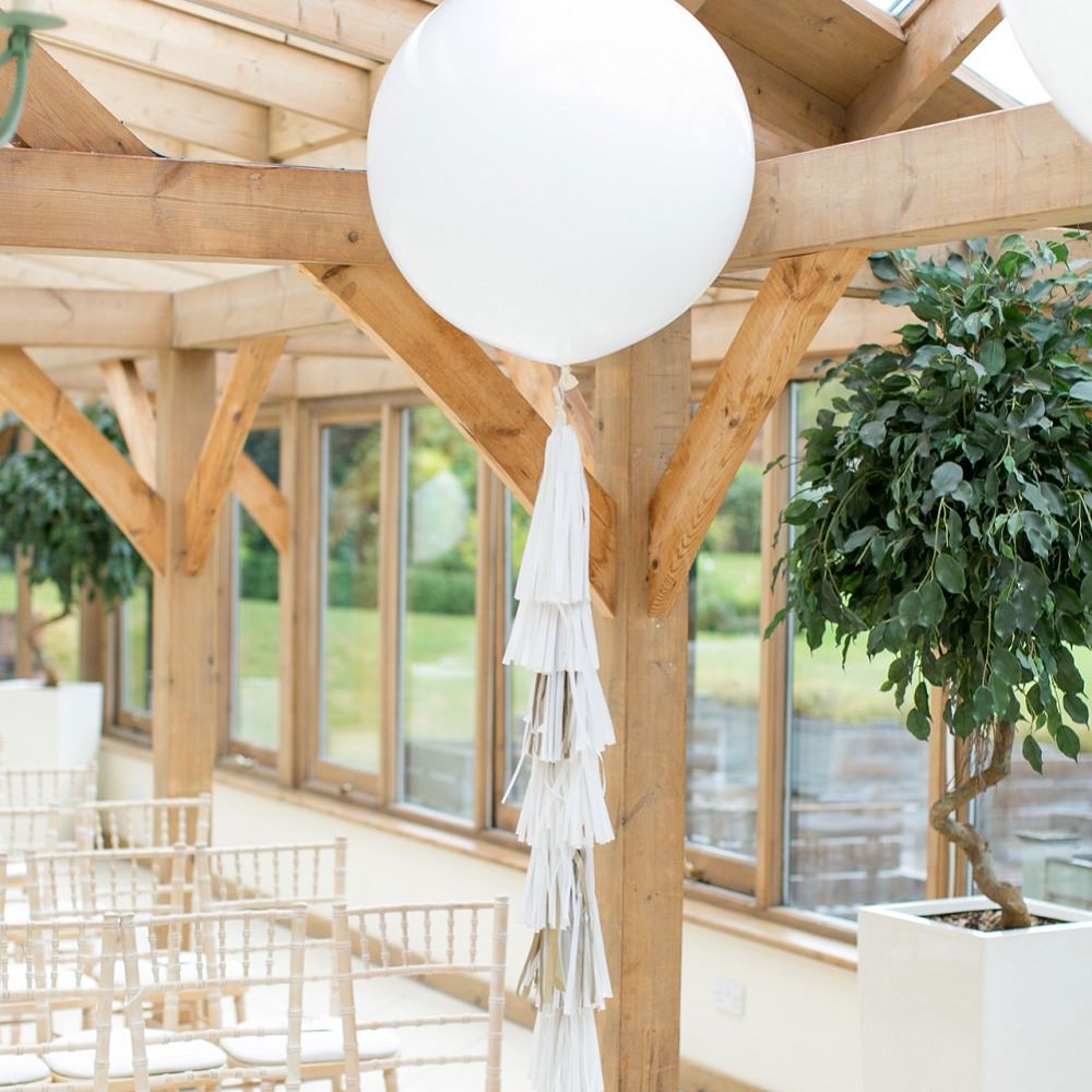 Giant Balloons with Tissue Tassels | Pastel Wedding at Gaynes Park | Anneli Marinovich Photography