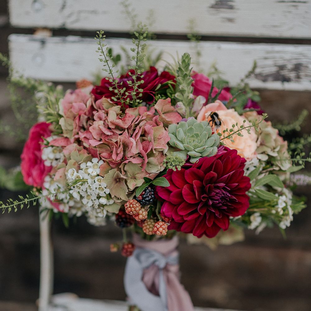 Structured Wedding Bouquet In Deep Reds & Oranges
