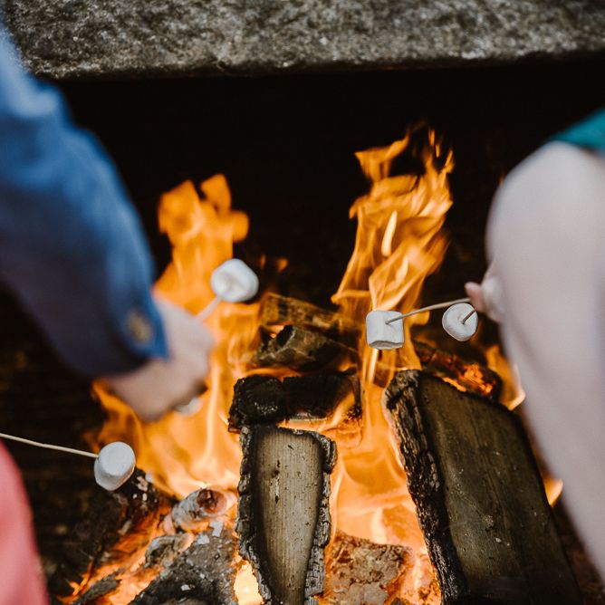 Toasting Marshmallows at Wedding