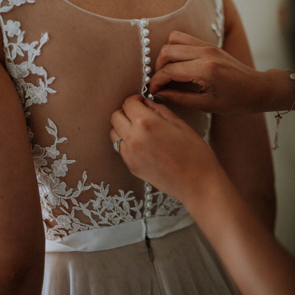 Illusion Back Bridal Gown | Colourful DIY Barn Wedding at The Manor Barn, Cambridge | Meghan Lorna Photography