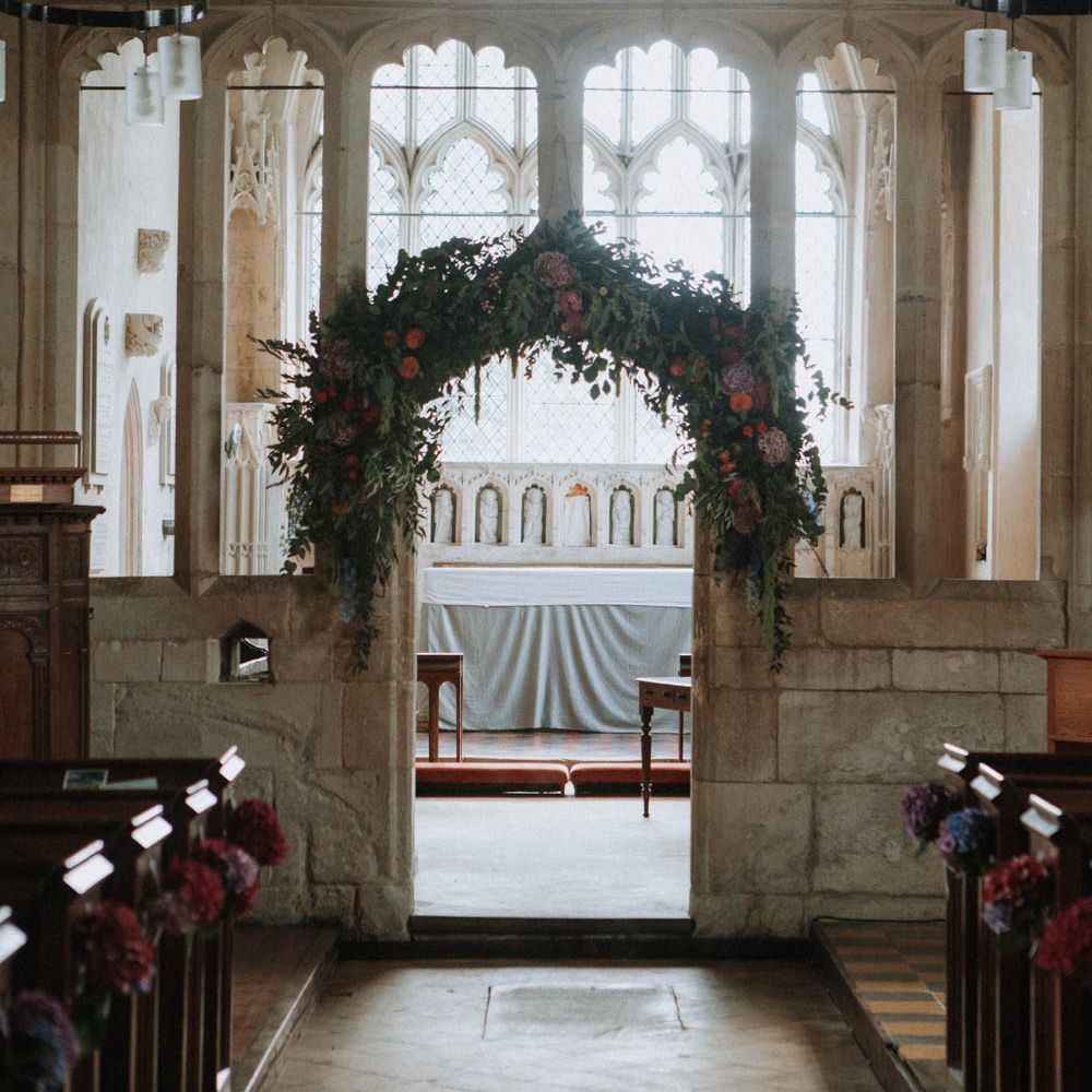 Floral Arch Church Flowers | Colourful DIY Barn Wedding at The Manor Barn, Cambridge | Meghan Lorna Photography