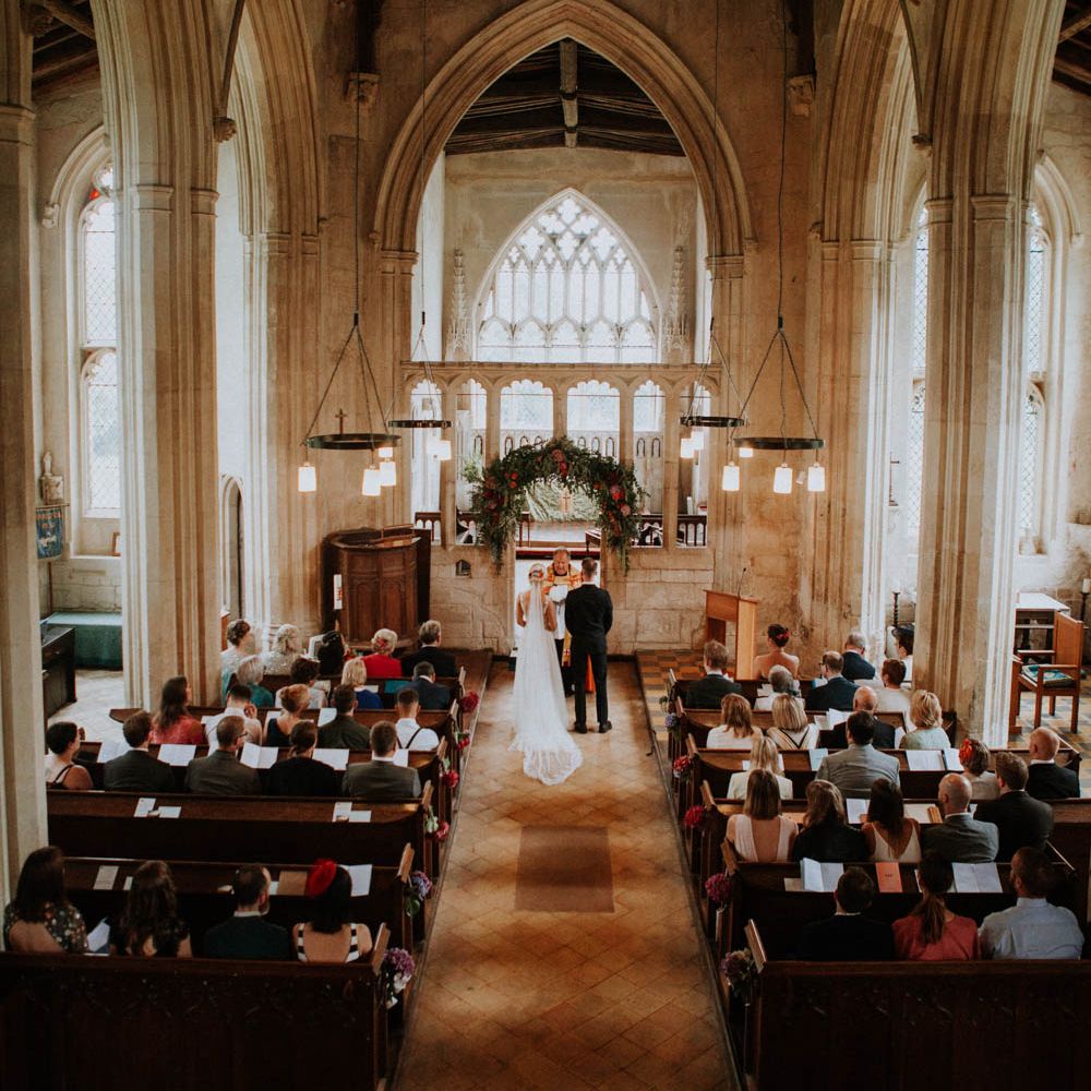 Church Wedding Ceremony | Bride in Lace & Tulle Gown | Groom in Black Suit & Liberty Print Bow Tie | Colourful DIY Barn Wedding at The Manor Barn, Cambridge | Meghan Lorna Photography