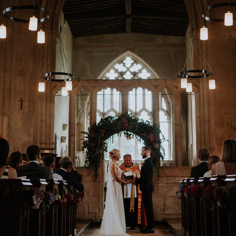 Church Wedding Ceremony | Bride in Lace & Tulle Gown | Groom in Black Suit & Liberty Print Bow Tie | Colourful DIY Barn Wedding at The Manor Barn, Cambridge | Meghan Lorna Photography