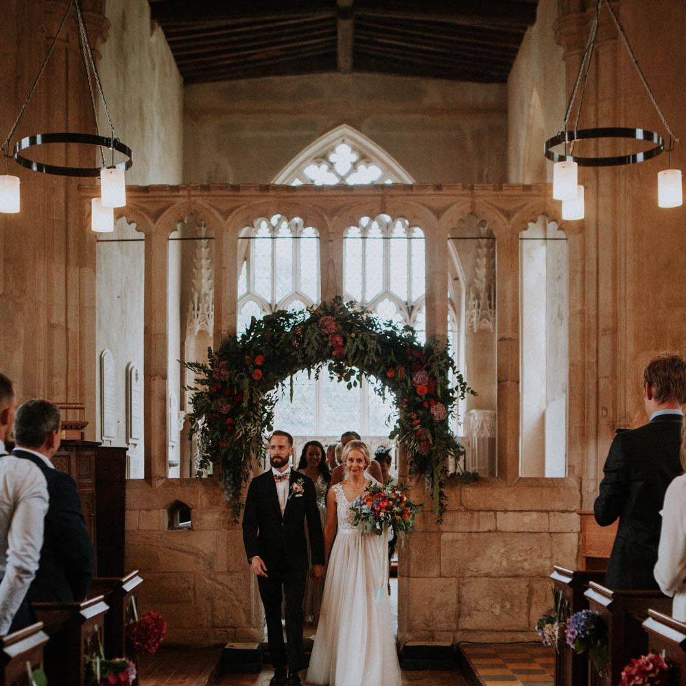 Church Wedding Ceremony | Bride in Lace & Tulle Gown | Groom in Black Suit & Liberty Print Bow Tie | Colourful DIY Barn Wedding at The Manor Barn, Cambridge | Meghan Lorna Photography