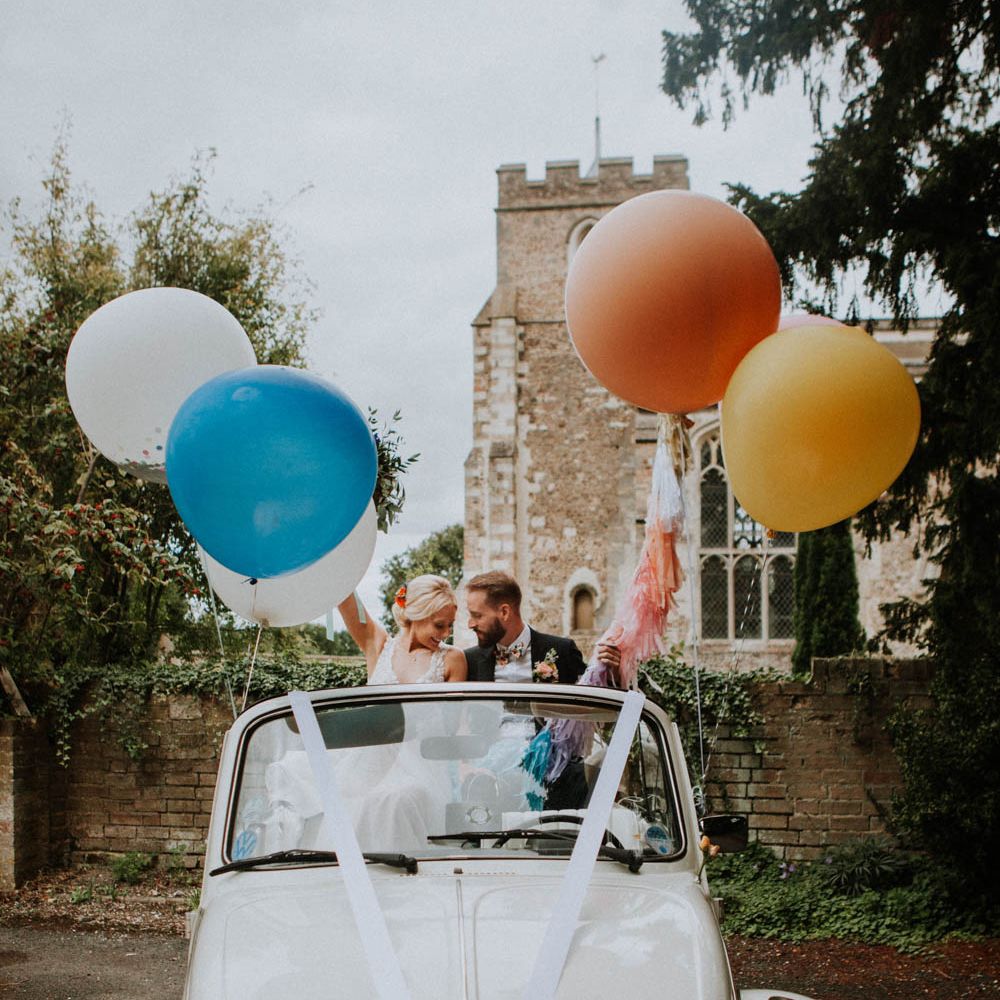 Giant Balloons | Bride in Lace & Tulle Gown | Groom in Suit & Bow Tie | Colourful DIY Barn Wedding at The Manor Barn, Cambridge | Meghan Lorna Photography