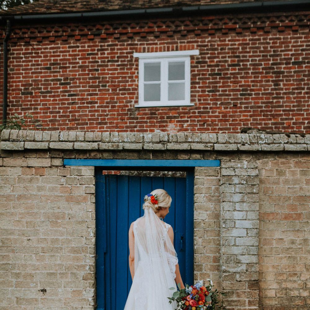 Bride in Lace & Tulle Gown | Colourful DIY Barn Wedding at The Manor Barn, Cambridge | Meghan Lorna Photography