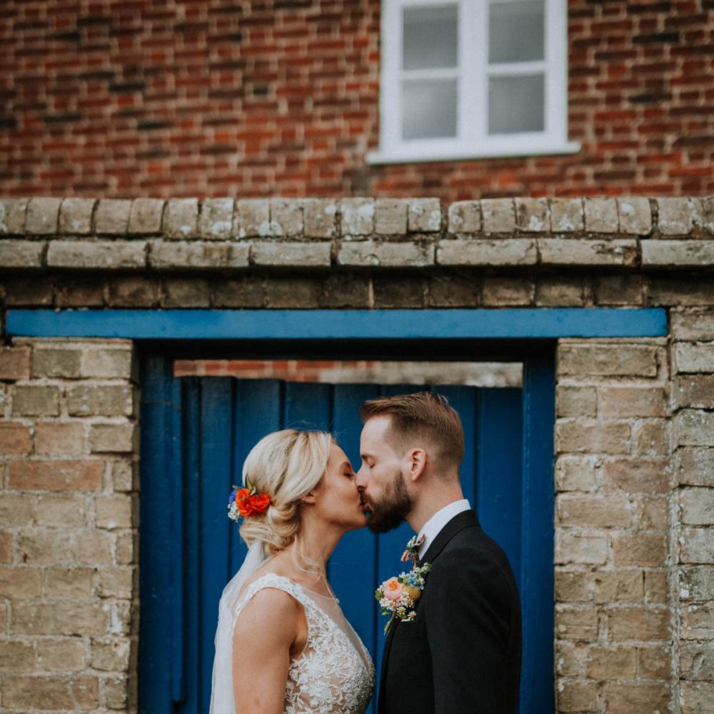 Bride in Lace & Tulle Gown | Groom in Black Suit & Liberty Print Bow Tie | Colourful DIY Barn Wedding at The Manor Barn, Cambridge | Meghan Lorna Photography