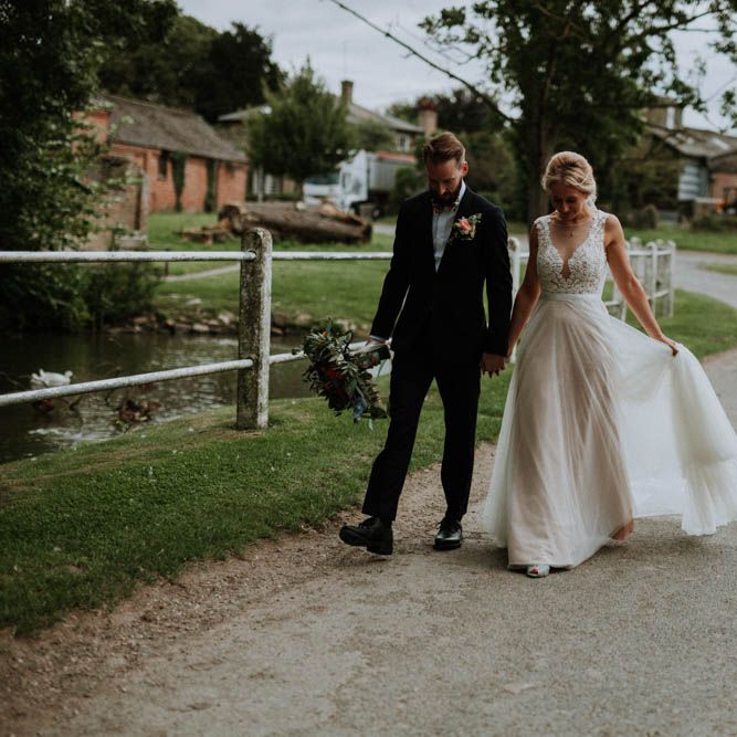 Bride in Lace & Tulle Gown | Groom in Black Suit & Liberty Print Bow Tie | Colourful DIY Barn Wedding at The Manor Barn, Cambridge | Meghan Lorna Photography