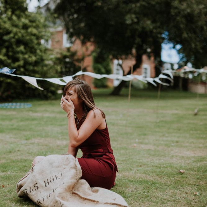 Sack Race Garden Games | Colourful DIY Barn Wedding at The Manor Barn, Cambridge | Meghan Lorna Photography