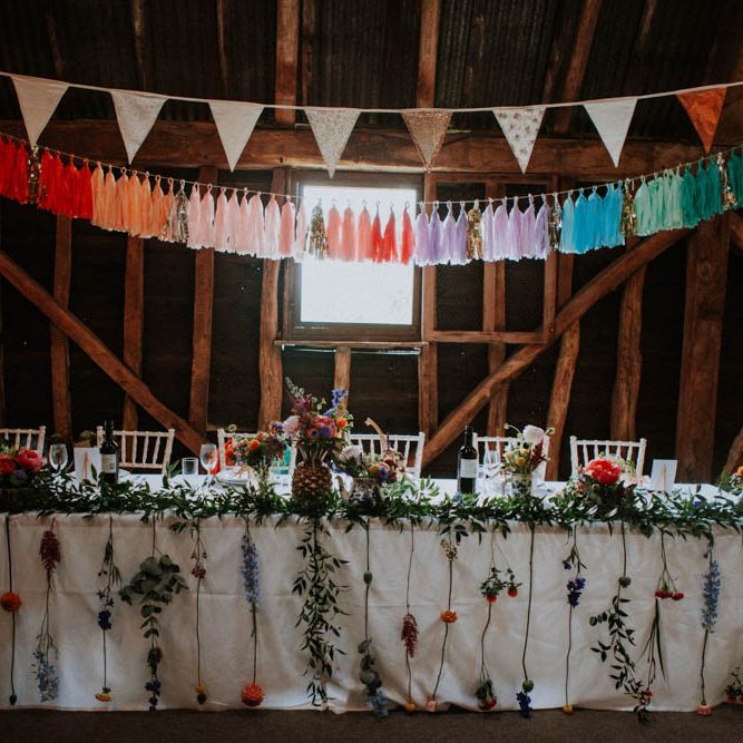 Top Table Wedding Decor | Rainbow Tassels | Colourful DIY Barn Wedding at The Manor Barn, Cambridge | Meghan Lorna Photography