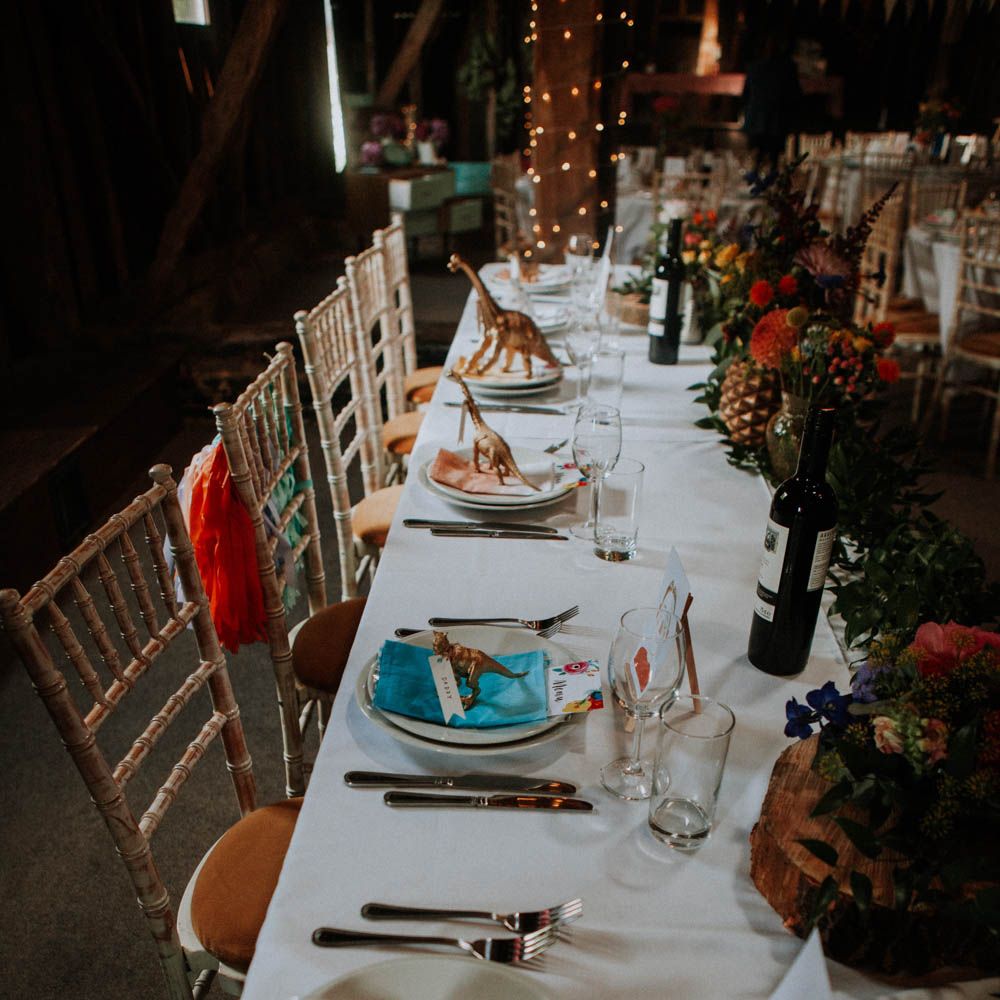 Spray Painted Dinosaur Place Setting | Colourful DIY Barn Wedding at The Manor Barn, Cambridge | Meghan Lorna Photography