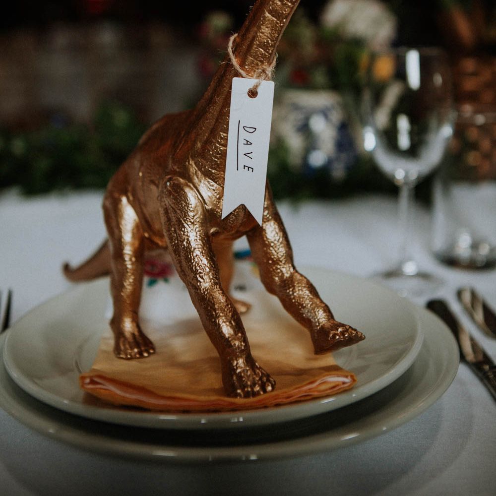 Spray Painted Dinosaur Place Setting | Colourful DIY Barn Wedding at The Manor Barn, Cambridge | Meghan Lorna Photography
