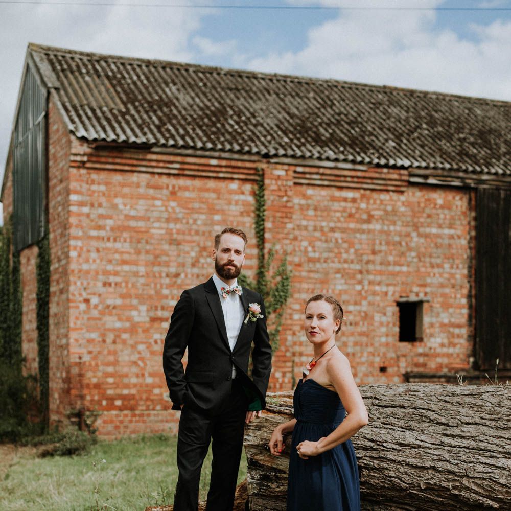 Groom in Black Suit & Liberty Print Bow Tie | Colourful DIY Barn Wedding at The Manor Barn, Cambridge | Meghan Lorna Photography