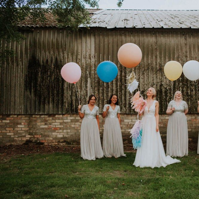 Giant Balloons | Bride in Lace Wedding Dress | Bridesmaids in Pale Blue ASOS Dresses | Colourful DIY Barn Wedding at The Manor Barn, Cambridge | Meghan Lorna Photography