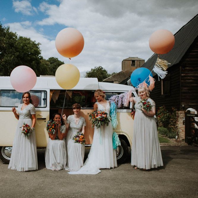 Giant Balloons | Colourful DIY Barn Wedding at The Manor Barn, Cambridge | Bride in Lace Wedding Dress | Bridesmaids in Pale Blue ASOS Dresses | Meghan Lorna Photography