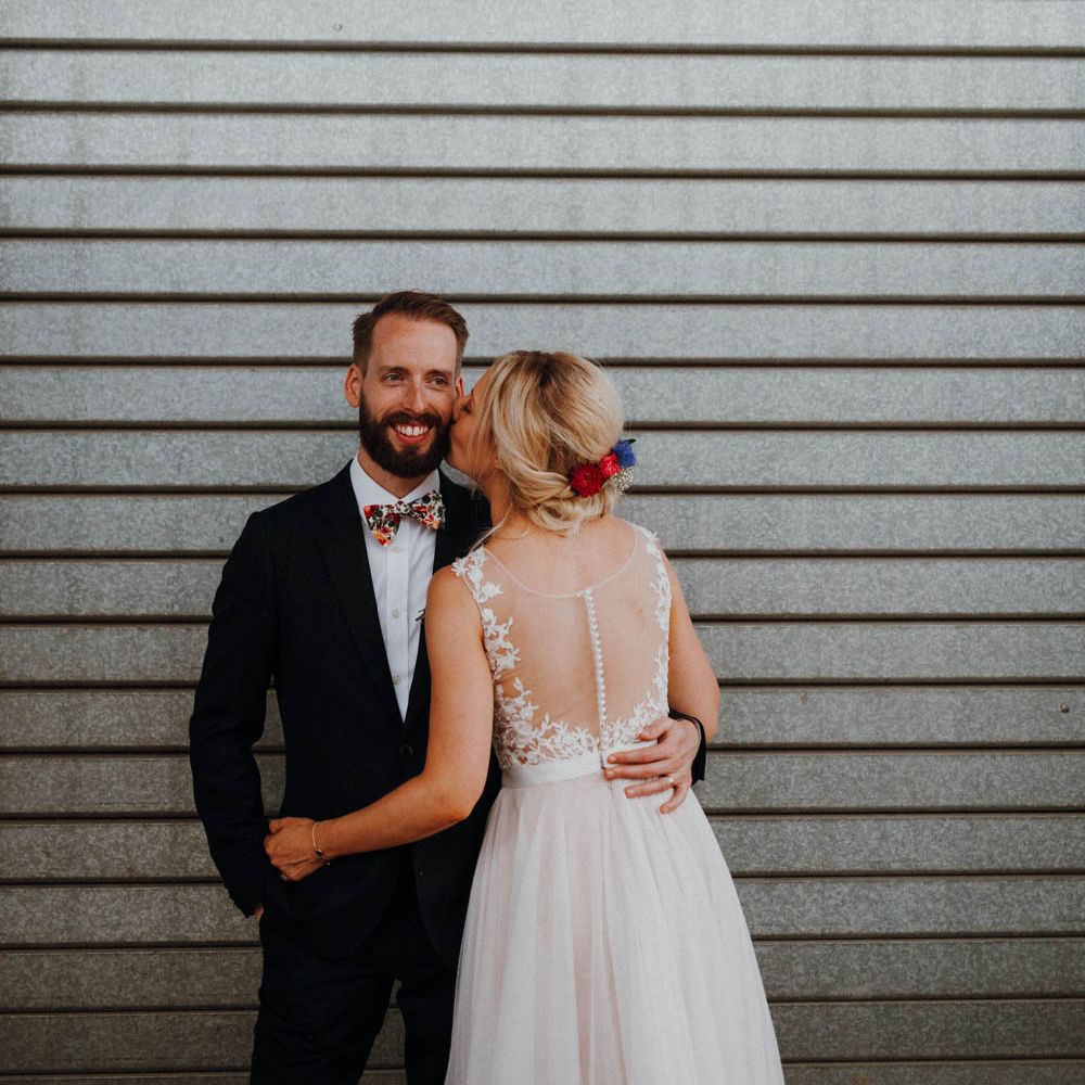 Bride in Backless Lace & Tulle Wedding Dress | Groom in Bow Tie | Colourful DIY Barn Wedding at The Manor Barn, Cambridge | Meghan Lorna Photography