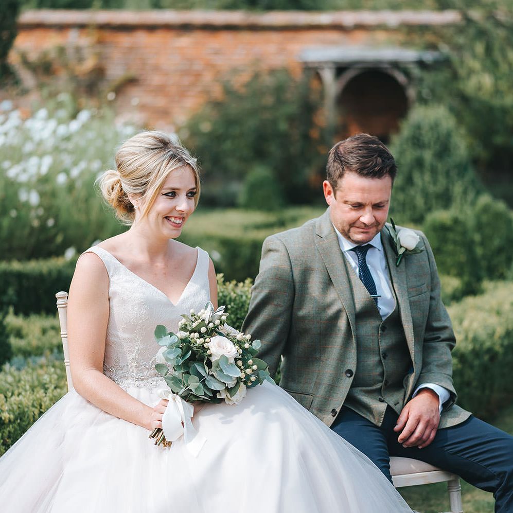 Bride in Phil Collins Bridal Gown for an Outdoor Wedding Ceremony