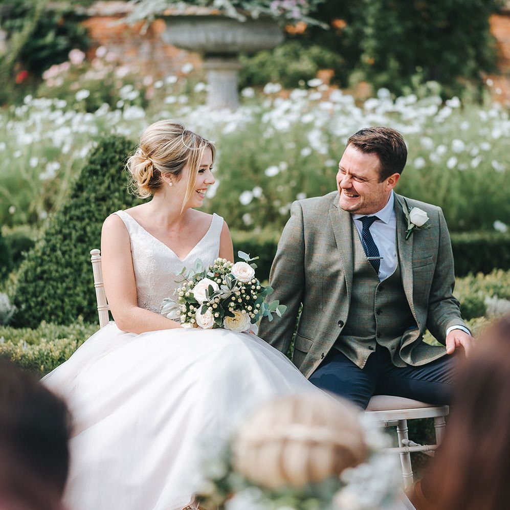 Bride in Phil Collins Bridal Gown for an Outdoor Wedding Ceremony