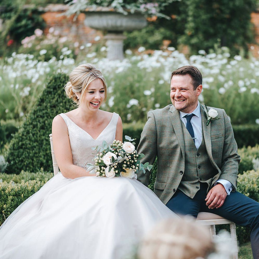 Bride in Phil Collins Bridal Gown for an Outdoor Wedding Ceremony