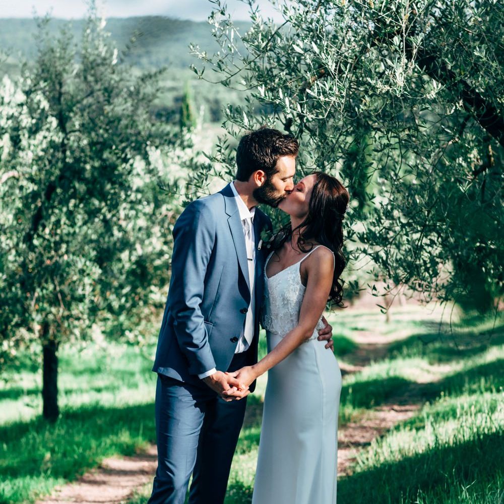 Bride in Sarah Seven Wedding Dress | Groom in Navy Paul Smith Suit | Outdoor Intimate Wedding at Casa Cornacchi in Tuscany, Italy | Dale Weeks Photography