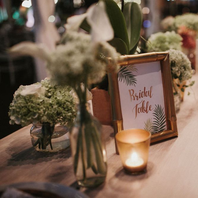 Incredible Outdoor Wedding Reception In Bali With Hanging Florals & Fairy Lights