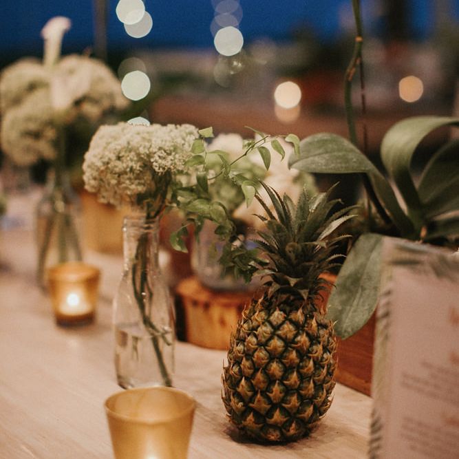 Incredible Outdoor Wedding Reception In Bali With Hanging Florals & Fairy Lights