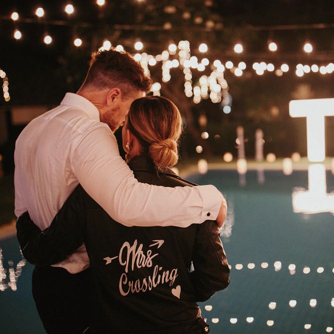 Incredible Outdoor Wedding Reception In Bali With Hanging Florals & Fairy Lights