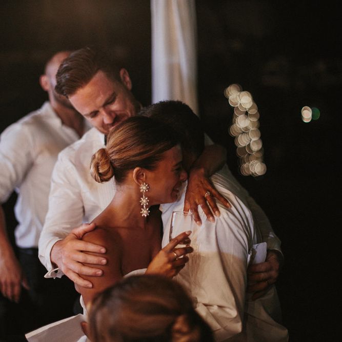 Incredible Outdoor Wedding Reception In Bali With Hanging Florals & Fairy Lights