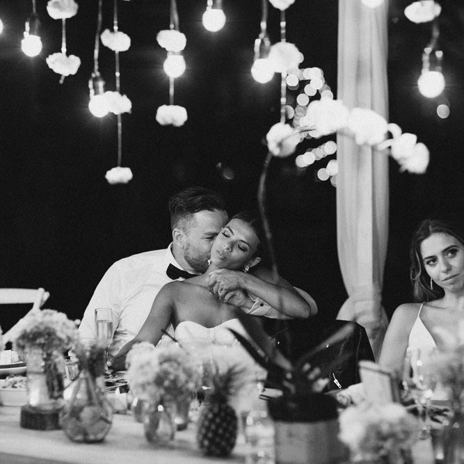 Incredible Outdoor Wedding Reception In Bali With Hanging Florals & Fairy Lights