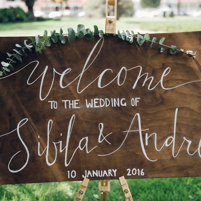Wooden Welcome Sign with Eucalyptus Garland