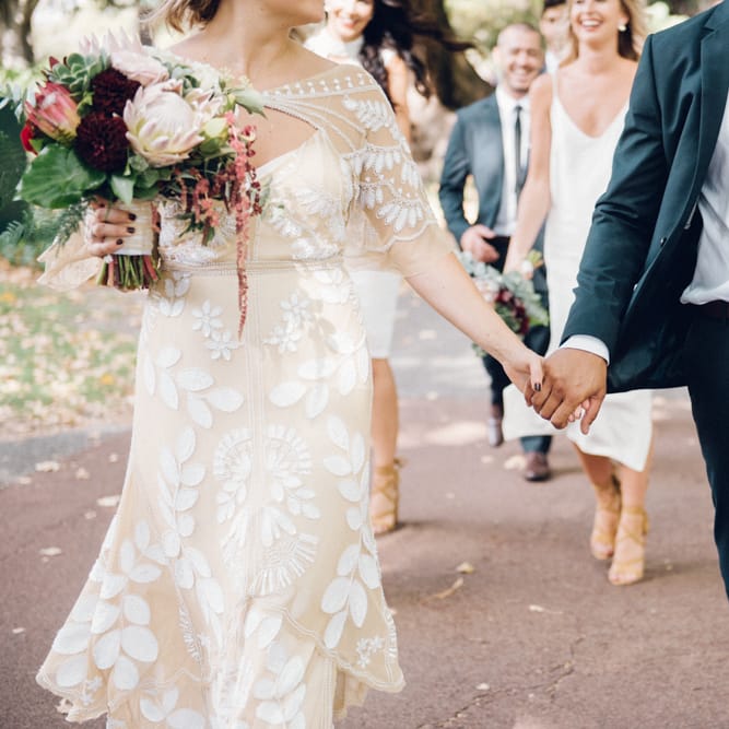 Bride & Groom Holding Hands