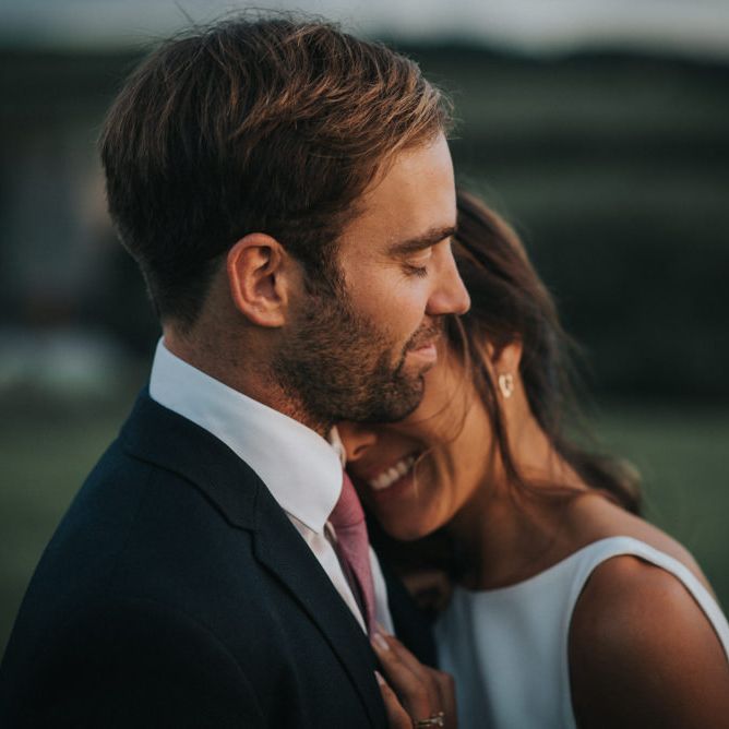 Bride & Groom Shoulder Embrace