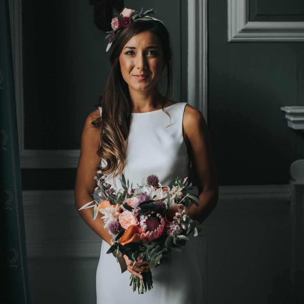 Bride in Charlie Brear Torum Gown with Flower Crown & Bouquet