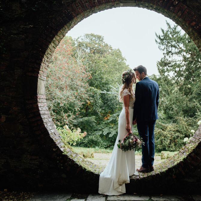 Bride in Bespoke Suzanne Neville Scarlett Bridal Gown | Groom in Herbie Frogg Suit & Liberty Print Mrs Bow Tie | The Lou's Photography