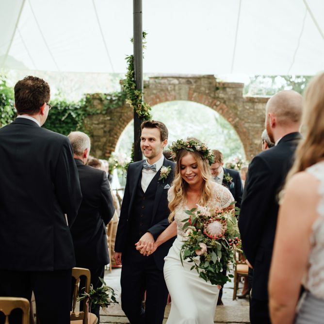 Outdoor Ceremony at Drenagh Estate in Northern Ireland | Bride in Bespoke Suzanne Neville Scarlett Bridal Gown | Protea Bouquet & Flower Crown | The Lou's Photography