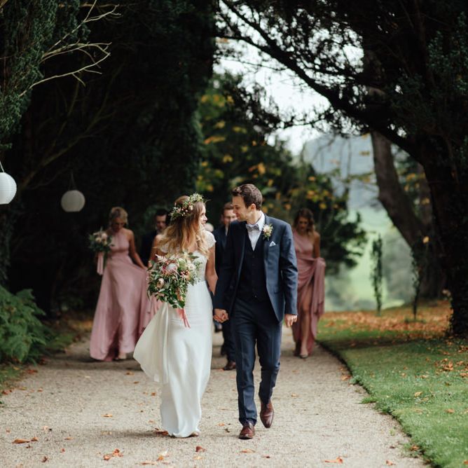 Bride in Bespoke Suzanne Neville Scarlett Bridal Gown | Groom in Herbie Frogg Suit & Liberty Print Mrs Bow Tie | The Lou's Photography