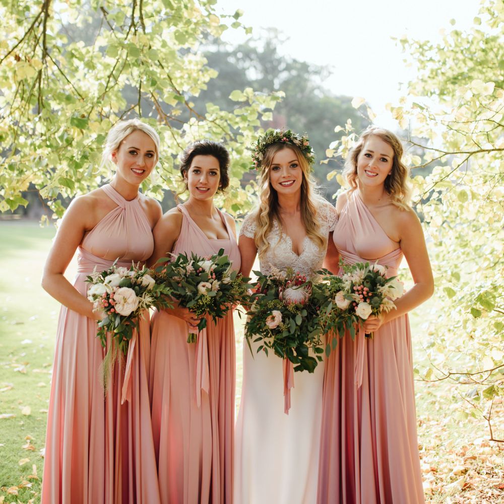 Bride in Bespoke Suzanne Neville Scarlett Bridal Gown | Bridesmaids in Pink Twobirds Dresses | The Lou's Photography
