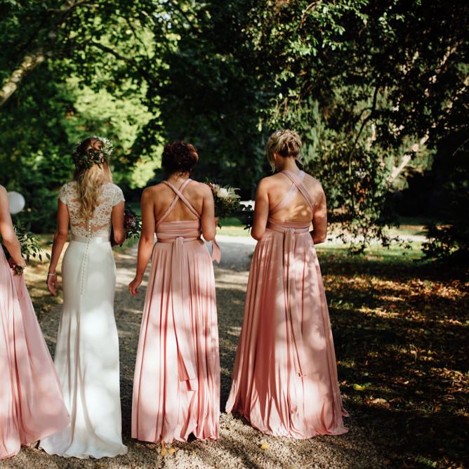 Bride in Bespoke Suzanne Neville Scarlett Bridal Gown | Bridesmaids in Blush Pink Multiway Twobirds Dresses | The Lou's Photography