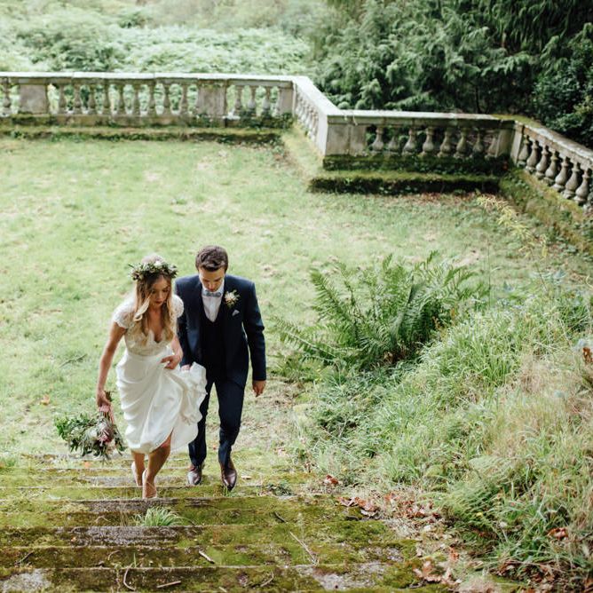 Bride in Bespoke Suzanne Neville Scarlett Bridal Gown | Groom in Herbie Frogg Suit & Liberty Print Mrs Bow Tie | The Lou's Photography