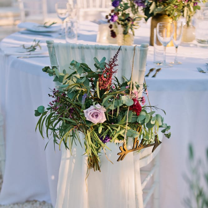 Floral Chair Back Decor | Jewel Coloured Spanish Wedding Planned & Styled by Rachel Rose Weddings | Anna Gazda Photography