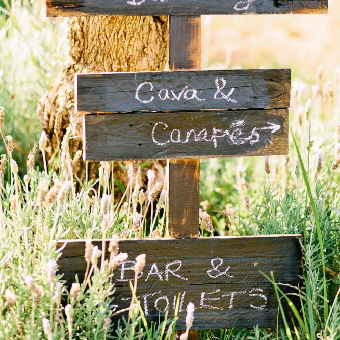 Wooden Direction Sign Post | Jewel Coloured Spanish Wedding Planned & Styled by Rachel Rose Weddings | Anna Gazda Photography