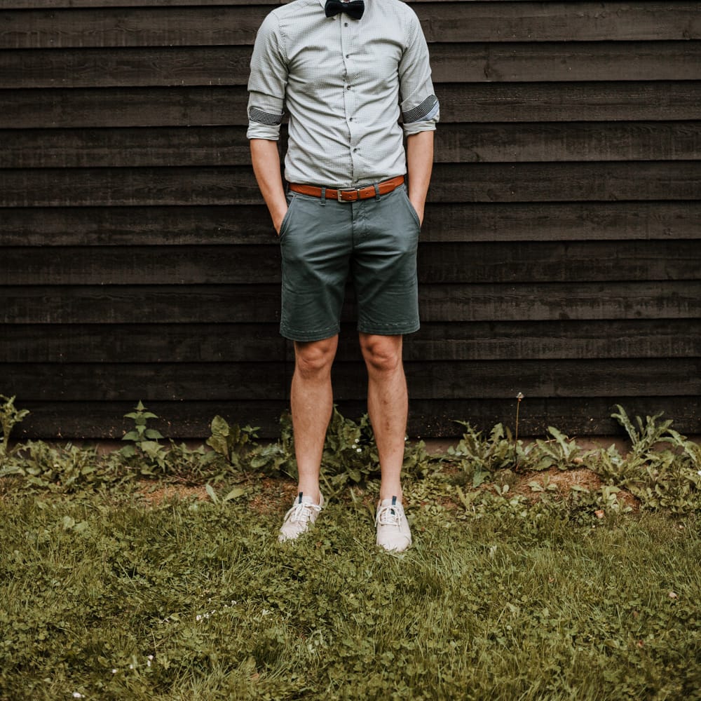Groom In Shorts & Shirt For Relaxed Festival Wedding
