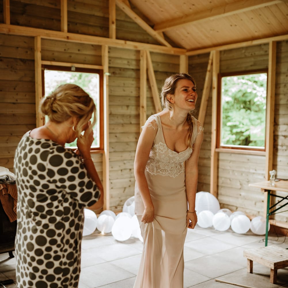 Bride In Bespoke Wedding Dress With Champagne Underlay