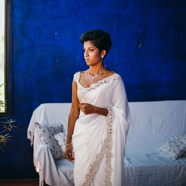 Bride In White & Gold Sari
