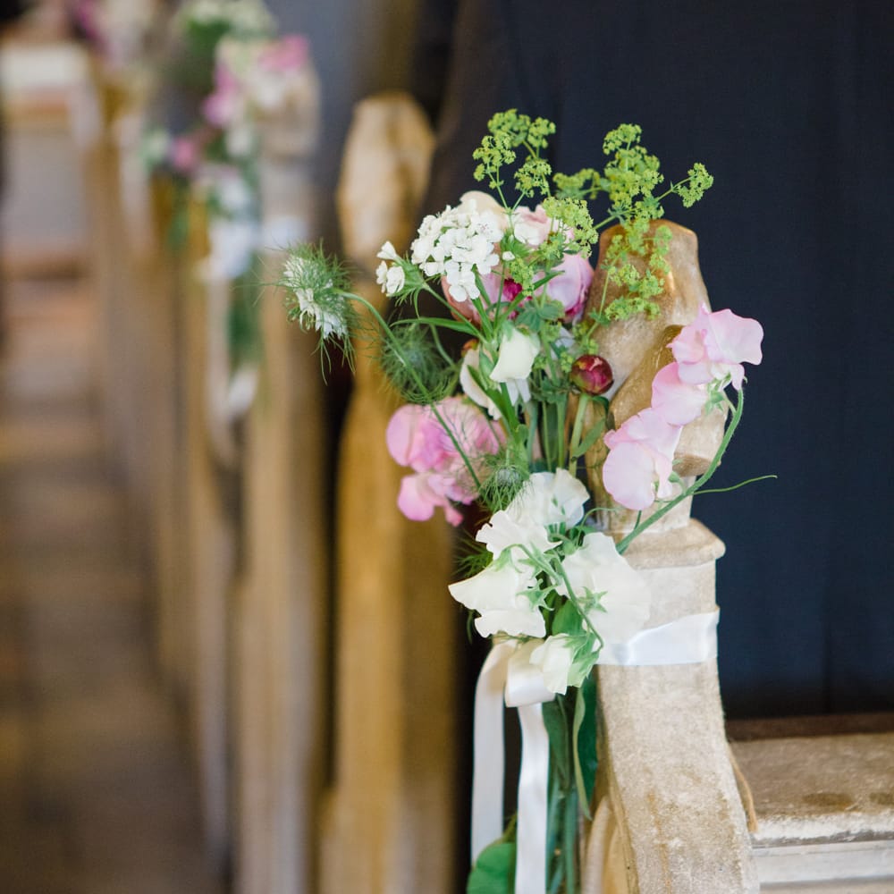 Pew Flowers | Bride in Ingrida Bridal Gown | Beautiful Classic Wedding at Cornwell Manor | Lucy Davenport Photography