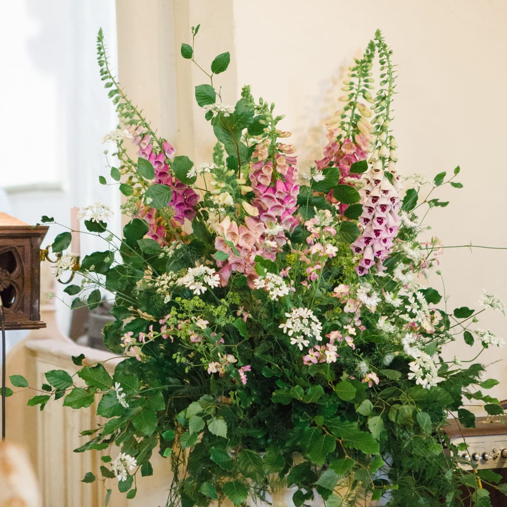 Church Floral Arrangement | Bride in Ingrida Bridal Gown | Beautiful Classic Wedding at Cornwell Manor | Lucy Davenport Photography