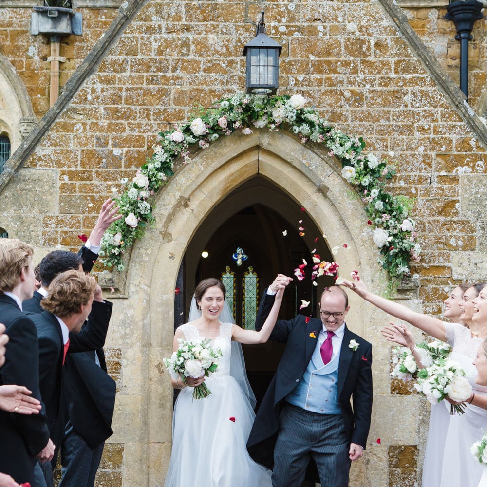 Confetti Exit | Bride in Ingrida Bridal Gown | Groom in Tails | Beautiful Classic Wedding at Cornwell Manor | Lucy Davenport Photography