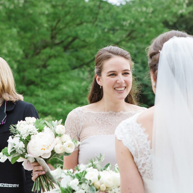 Wedding Guest Hugs | Bride in Ingrida Bridal Gown | Beautiful Classic Wedding at Cornwell Manor | Lucy Davenport Photography