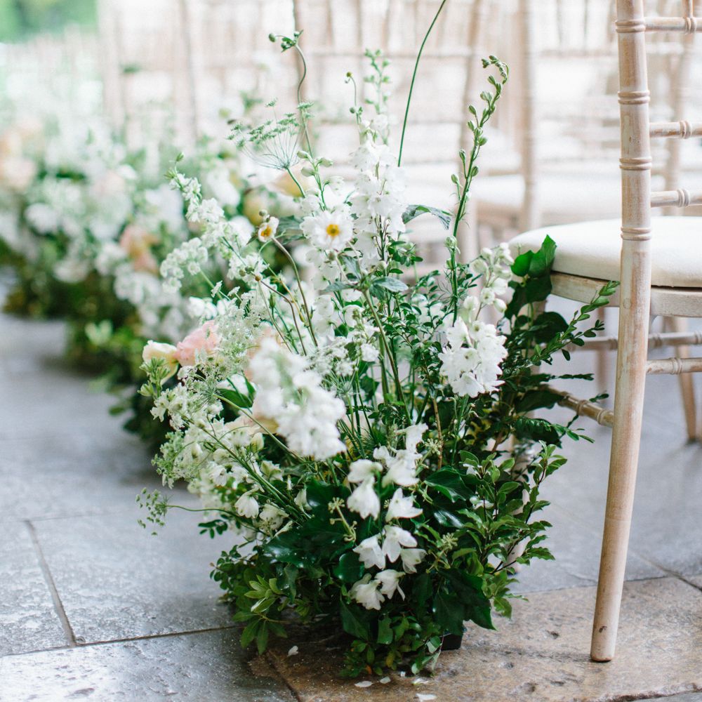 Wedding Aisle Lined With Fresh Flowers by Petalon